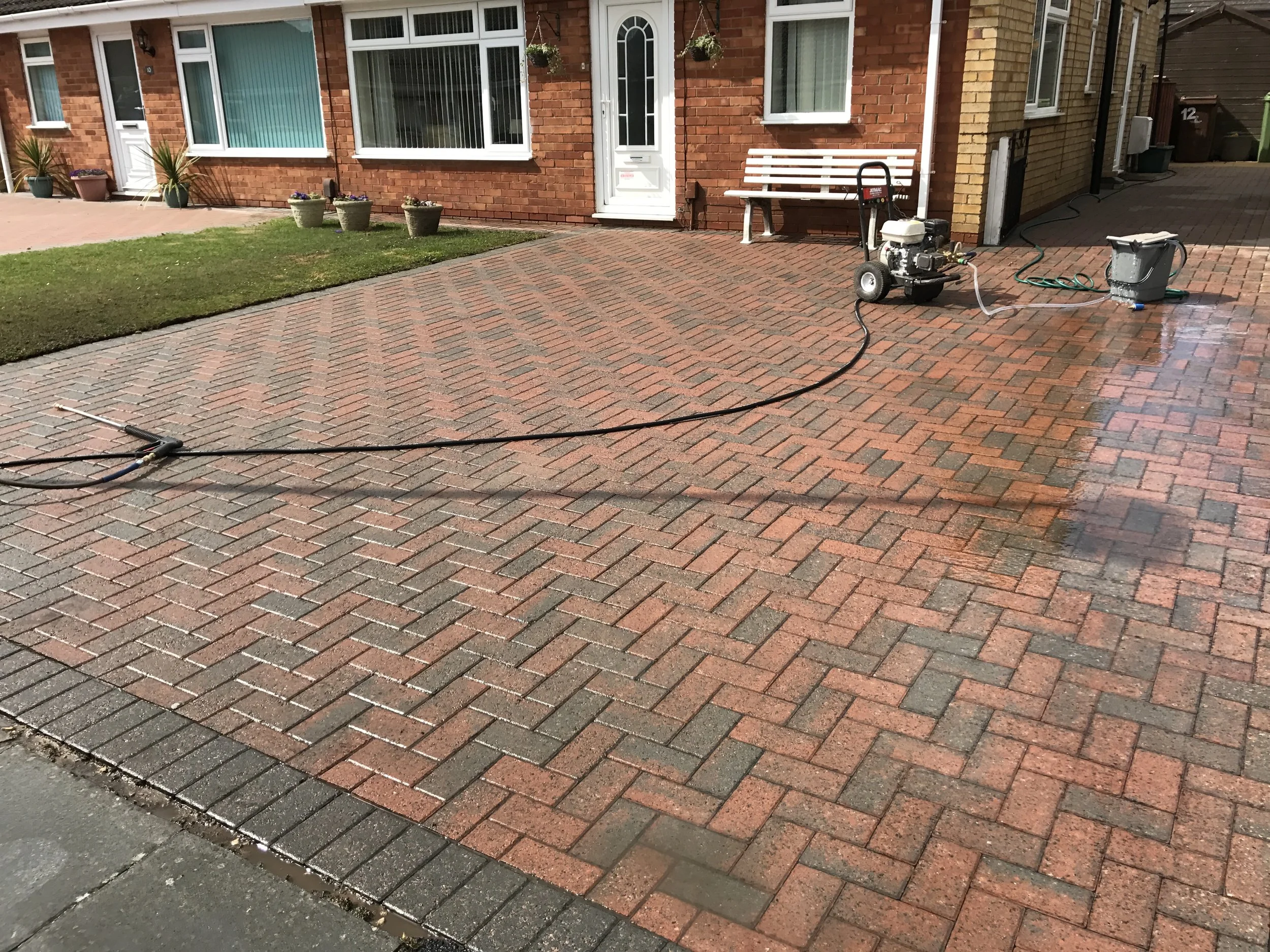 Clean block paving driveway after professional pressure washing service in York